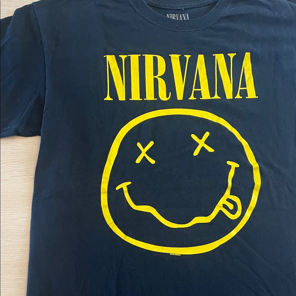 NIRVANA Black Tee with Yellow Smiley Design